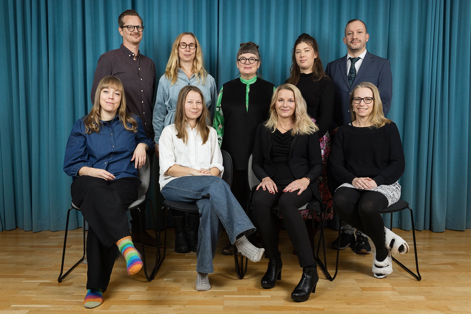 Gruppbild på nio personer.